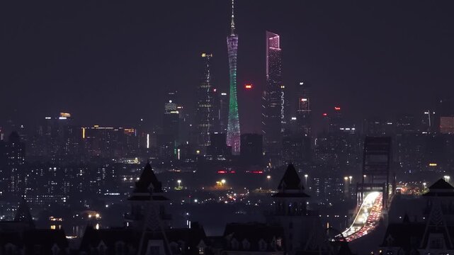 Night city skyline illuminated skyscrapers buildings, traffic over bridge. Urban landscape, twilight travel, tourism concept. Modern town drone view. Cityscape background. Futuristic architecture.