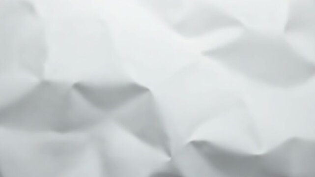 Video A close-up view of a sheet of crumpled paper, with wrinkles and creases visible