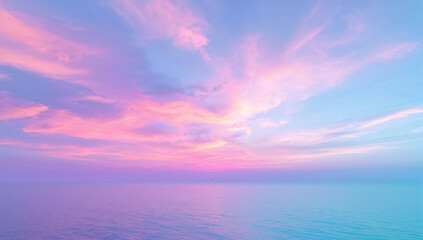 Fototapeta premium Serene ocean horizon with vibrant pink and blue pastel clouds at sunset
