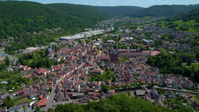 An aerial view beside the old town above the city Amorbach , Germany on a sunny day in spring