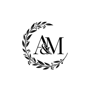 An elegant black and white monogram logo featuring the letters A and M connected by an ampersand, encircled by a delicate floral wreath.