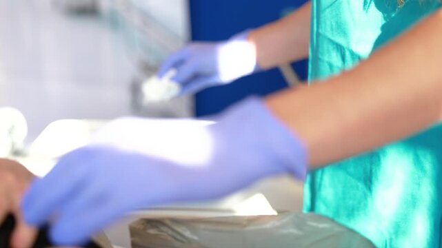 Stoma cleaning training on ostomy dummy demonstrating aseptic technique and peristomal care in nursing practice