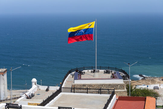 El Vig&iacute;a fort in La Guaira, Venezuelan flag waving in the Caribbean Sea