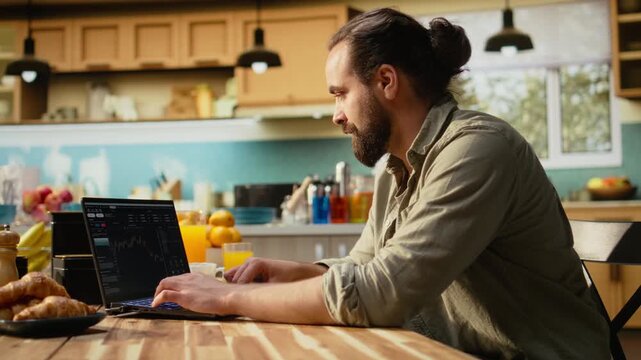 Financial trader at home, day trading fluctuations, monitoring market trends, candlestick charts on laptop used to check platform for investments. Stock exchange assets, crypto currency trade.