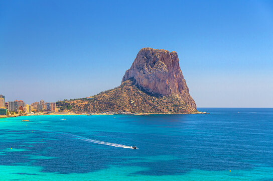 Penyal d'Ifac Natural Park mountain Penon de Ifach on city Calpe aerial view Costa Blanca coast, Calpe bay Mediterranean Sea, azure water in summer day, Alicante province, Valencian Community, Spain