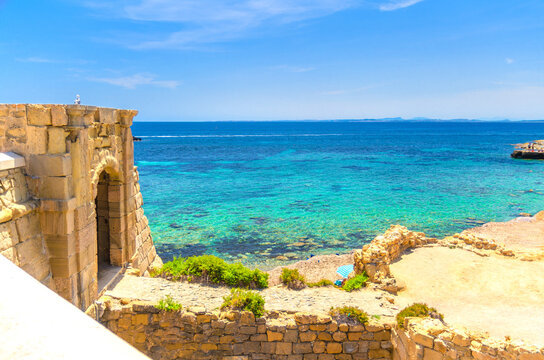 Porta de la Trancada o de Sant Gabriel Gate on Tabarca Island Nueva Tabarca Isla Plana, Mediterranean Sea Alicante bay azure water in sunny summer day, Alicante province, Valencian Community, Spain