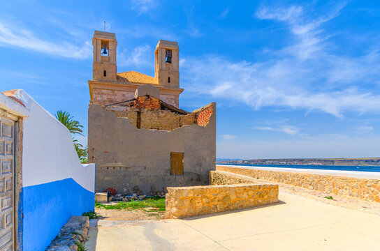 St Peter and St Paul catholic church Iglesia de San Pedro y San Pablo and sea view on Tabarca Island Nueva Tabarca Isla Plana town in sunny summer day, Alicante province, Valencian Community, Spain