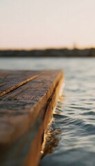 Fototapeta premium Tranquil summer waves meet weathered pier serene landscape evokes peaceful golden hour reflections