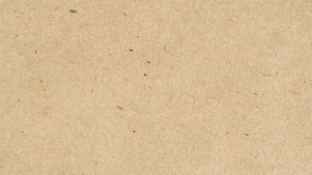 Old cinematic film grain transitions.  Vintage paper texture with subtle grain. authentic 16mm film texture for a vintage cinematic look.  grain texture footage, dust on gray paper texture moving. 