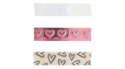 Set of three decorative washi tapes with heart patterns on a transparent background
