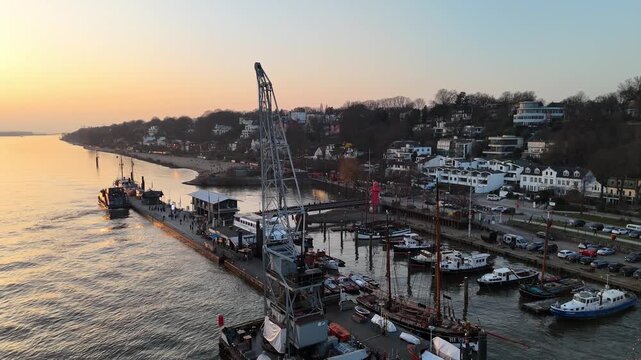 Hamburg Germany 2026 03 09: Aerial drone video of the Museum Harbor at the Elbe River in Hamburg &Ouml;velg&ouml;nne during gorgeous sunset