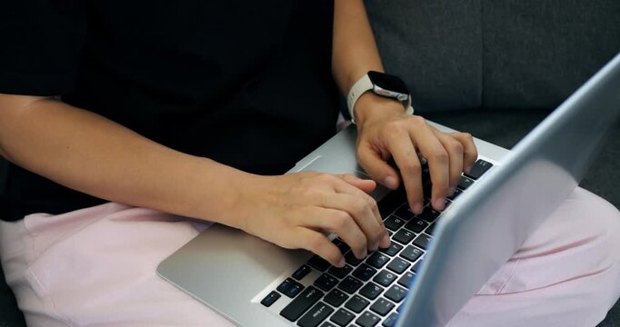Focused Data Professional. Detailed Data Review Conducted by Analyst in Personal Workspace. Precision Data Examination Performed by Analyst Using Laptop in Comfortable Home Environment