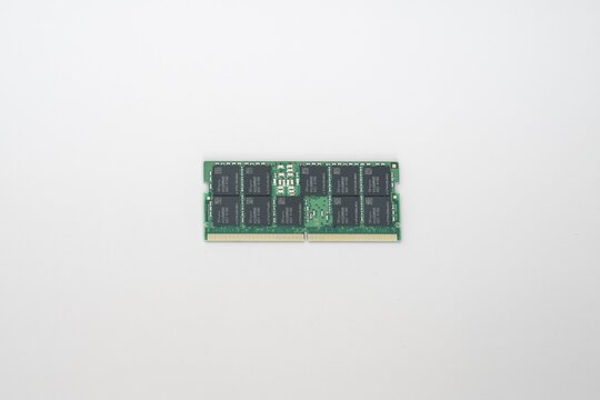 DDR5 ECC RAM Memory Module by SK hynix on White Background. High-resolution studio shot of a green DDR5 ECC RAM memory module with SK hynix chips, isolated on white background.