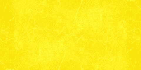 Obraz premium Vibrant yellow grunge texture background with distressed weathered paint effect and abstract scratched marble pattern