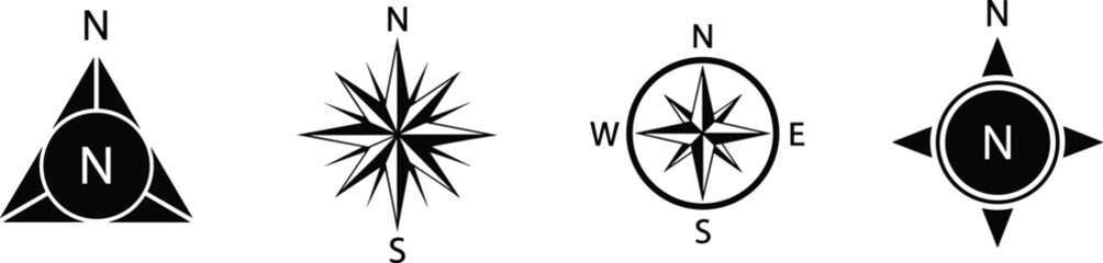 Four different compass rose symbols © Craft Designer