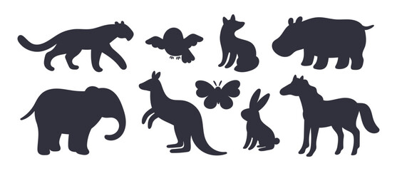 Fototapeta premium Silhouettes of cartoon animals. Wild fauna. Kangaroo and elephant. Owl bird and butterfly flying. Forest rabbit. Horse black figure. Hippopotamus and tiger. Vector graphic elements set