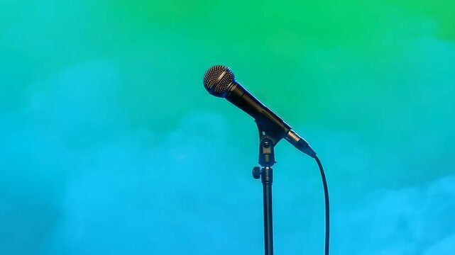 minimal composition microphone with blue smoke, over a green screen for vfx projects video