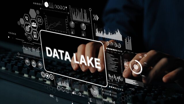 Hands Typing on Keyboard with Digital Data Lake Concept Overlaid in Futuristic Interface Design for Technology and Business Applications. Asymptotic smart data analytic.