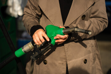 Driver filling car tank with gasoline pump © Rabizo Anatolii