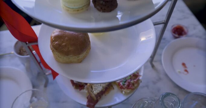 Steady cam high shot over treats on plate tower