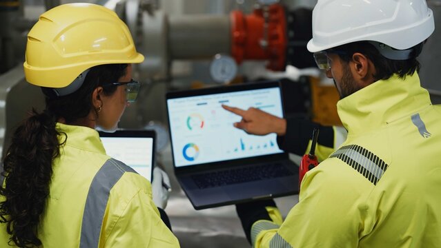 HVAC engineer conducts preventive maintenance and system tuning to optimize energy use and reliability in factory and building systems.