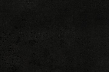 Fototapeta premium Texture of black stone surface as background, closeup
