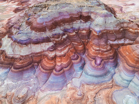 Aerial shot of Rainbow mounatains drone picture. Colorful bentonite hills from above. Utah. USA 