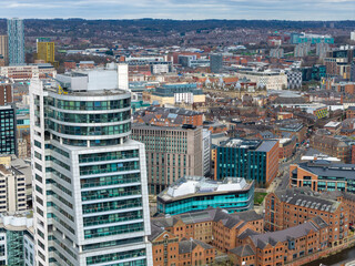 Aerial urban skyline view of Leeds city centre with Whitehall Waterfront apartments and surrounding buildings near the River Aire and Leeds railway station in the winter time © Duncan
