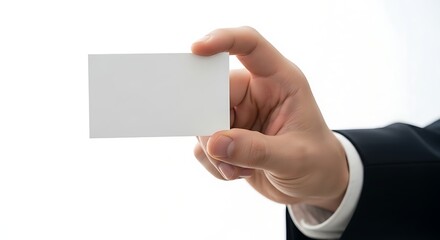 Obraz premium A hand holding a blank business card against a white background