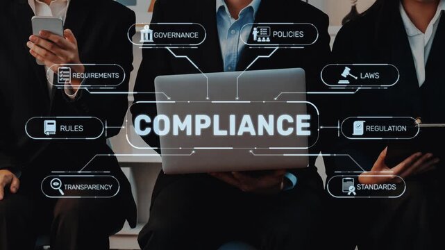 A close-up of business professionals examining compliance strategies using a laptop while discussing key concepts like regulations, governance, and transparency in a modern setting. Raster