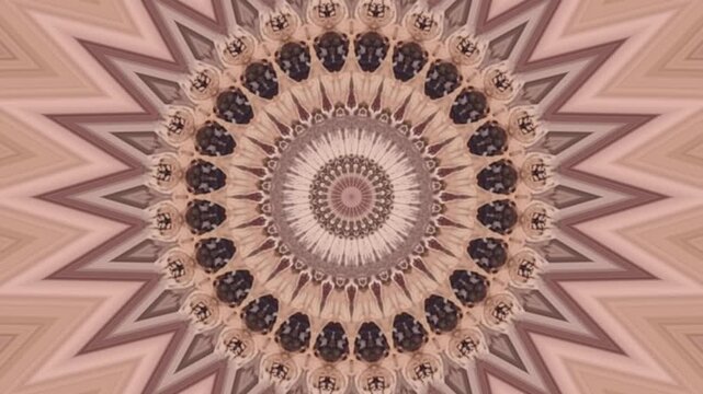 Geometric mandala pattern with pink, purple, and brown colors