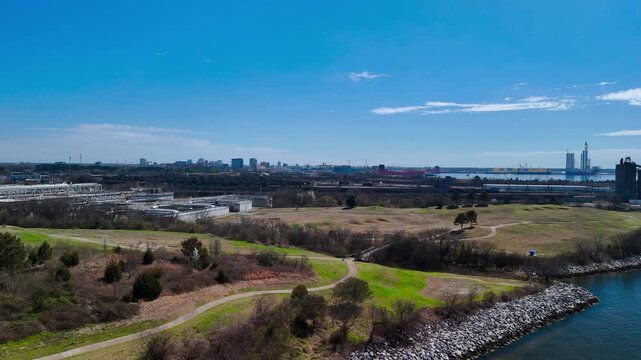 Aerial view of shipping containers and industrial port cranes on the Elizabeth River in Norfolk Virginia waterfront