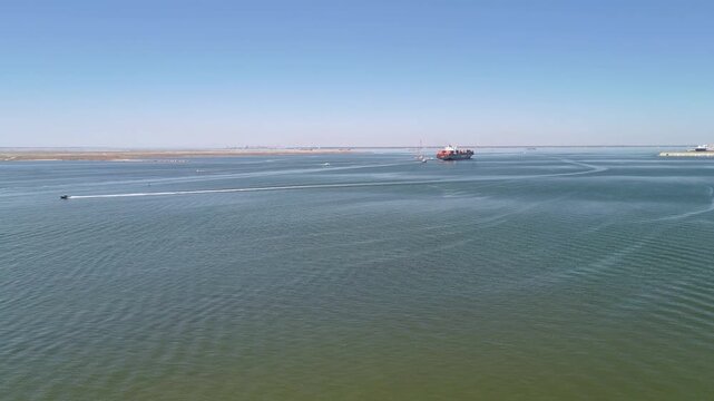Aerial view of shipping containers and industrial port cranes on the Elizabeth River in Norfolk Virginia waterfront