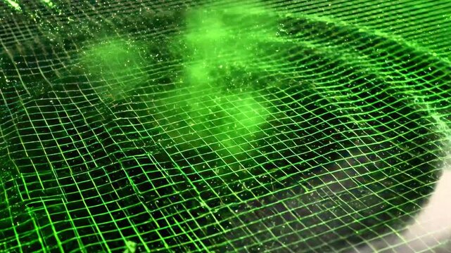 A vibrant green digital illustration of radiating lines and grid patterns creating a dynamic explosion effect