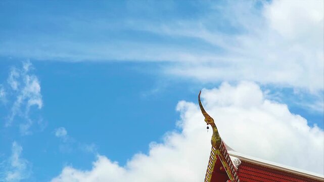 Cho fa thai language call it, like finial on the roof ridge and heap beautiful white cloud clear blue sky huge rollong