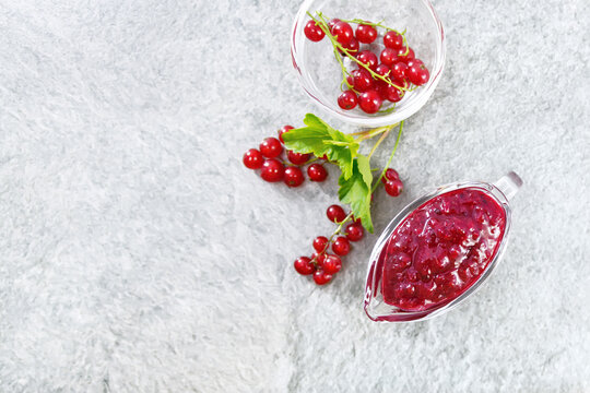 Sauce of redcurrant on stone top