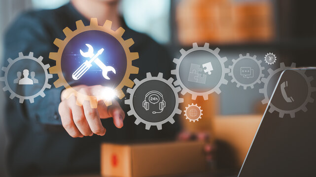 IT support and digital tools concept. Person using laptop with glowing wrench and screwdriver , representing system maintenance, tech service, customer support, and online troubleshooting in business