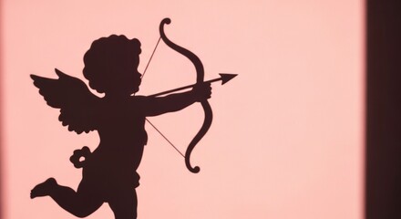 Naklejka premium Silhouette of a cherubic figure with wings, bow, and arrow aiming