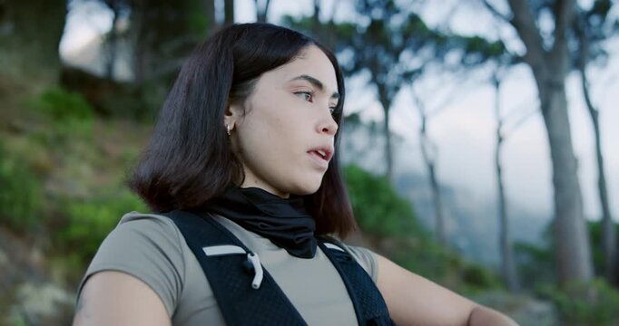 Runner, woman and break on mountain with smart watch, heart rate tracker and breathing for recovery. Active, person and stop workout in nature with tech, check step count or fitness app notification.