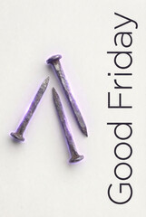 Three Rusty Nails on Background with Good Friday Text metal sharp