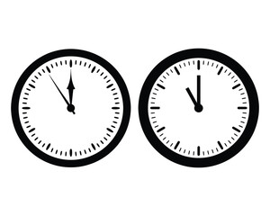 Two black and white analog clocks showing different times with simple minimalist