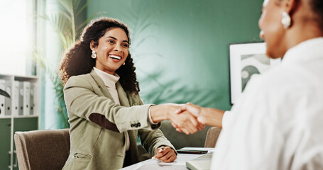 Happy, business people and meeting with handshake for interview, discussion or deal in office. Employees, colleagues or shaking hands with smile for job hiring, recruiting or onboarding opportunity © peopleimages.com