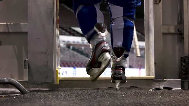 Hockey player entering the rink