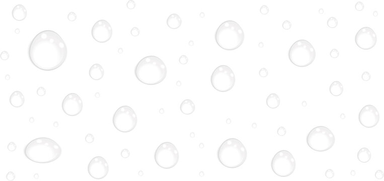 A grayscale image of scattered raindrops on a transparent surface