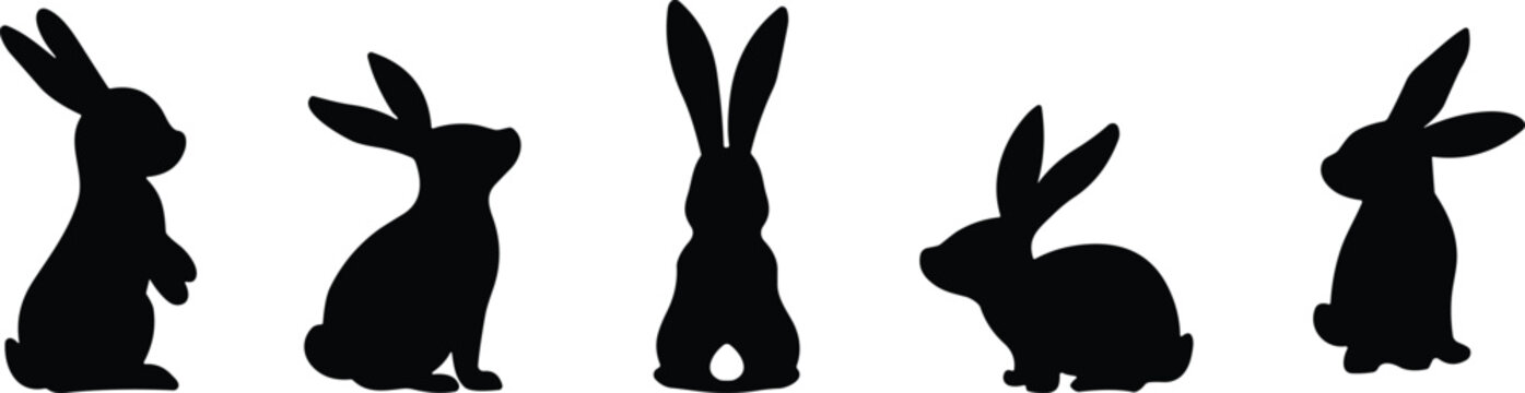 Cute rabbit silhouettes collection featuring different bunny poses and side views isolated on white background, animal vector icons for Easter design, wildlife graphics set