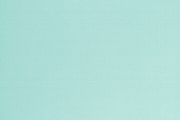 Teal Green background or turquoise blue silk fabric satin wallpaper texture cotton canvas cloth pattern in pale pastel color backdrop