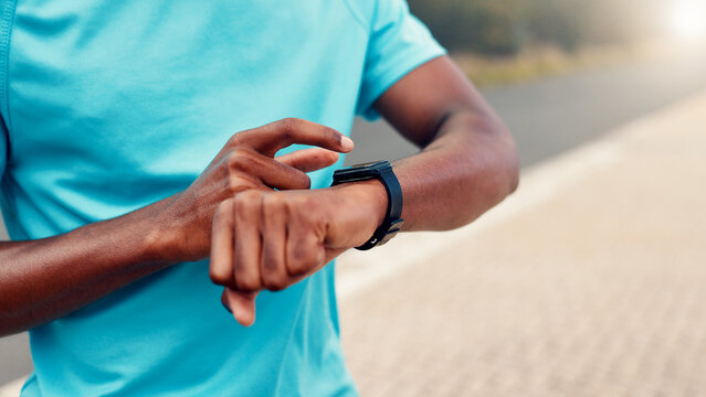 Hands, smart watch and timer for runner in summer, click and check map for direction in morning. Person, exercise and iot clock with stopwatch on application for fitness, heart rate and wellness