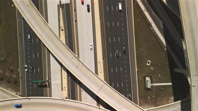 Dynamic aerial highway interchange with multilayer overpasses and traffic