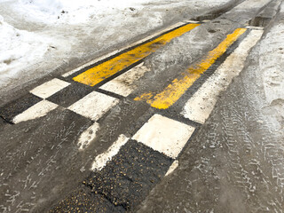 A yellow line is painted on the road