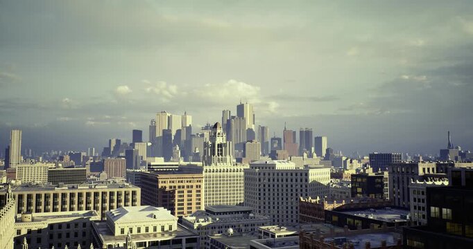 urban skyline from strategic vantage showing corporate highrises and gridlike blocks, executive outlook implying planning and market ambition, cool midday light